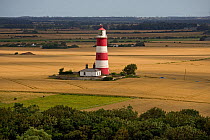 Lighthouse in the middle of farmland, Happisburgh, Norfolk, UK