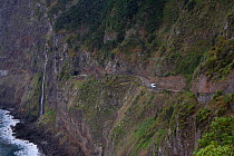 Steep Cliff road and road tunnel, near Funchal, Madeira, November