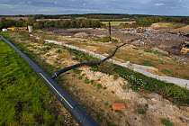 Household waste site in disused quarry with pipe drawing off the methane produced, Norfolk, UK