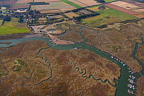 Aerial view of Morston Village, Quay and saltmarshes at high tide, Norfolk, UK, September