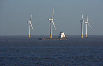 Wind turbines in offshore windfarm off Great Yarmouth, beach, Norfolk, UK
