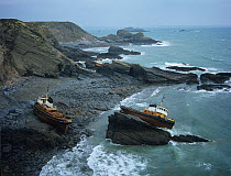Three fishing boats wrecked on the coast in winter storms, Pembrokeshire, UK,