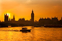 Silhouette of Big Ben and Houses of Parliament on the River Thames at dusk, London, UK, November 2005