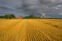 Wilton windmill, in distance across stubble field, near Hungerford, Berkshire, UK, August 2005