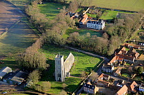Aerial view of Salthouse church and village, north Norfolk, UK, January 2011