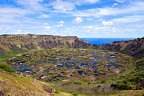 The crater lake of the extinct volcano Rano Kau on the southwestern part of Easter Island. South Pacific, October 2009.