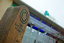 The National Forest sign and logo outside Moto service station, The National Forest, Central England, UK, November 2010
