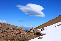 Alpine landscape with lenticular cloud. Los Alerces National Park, Argentina, March 2010.