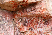 Cave hand paintings, dated to around 550 BC. Cueva de las Manos, Argentina, March 2010.