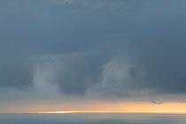 Dramatic light over sea at dusk, Hermaness NNR, Unst, Shetland Islands, Scotland, UK, June 2010.