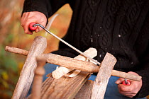 The National Forest Woodland craft  preparing wood to make a chair. Peter Wood runs Greenwood Days, teaching traditional woodland craft courses  like chair making  in the woodland. The business ben...