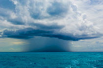 Isolated rain storm above the sea. Bahamas Sea, Bahamas, North America, August 2006.
