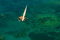 Vezo fisherman boat seen from the air in shallow waters. Nosy Be, north Madagascar, Africa, June 2007.