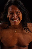 Portrait of a smiling Huaorani man. Bameno Community, Yasuni National Park, Ecuador, June 2007. Model release #CO24