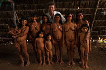 Pete Oxford with a group of Huaorani Indians. Bameno Community, Yasuni National Park, Ecuador, May 2007.