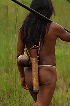Huaorani Indian going hunting with his blowgun. Bameno Community, Yasuni National Park, Ecuador, May 2007. Model release B#14.
