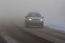 Traffic in freezing fog and heavy snow, Denbighshire, Wales, UK, December 2012
