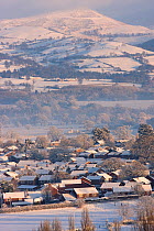 Town and countryside in exteme winter weather, Denbigh with Clwydian range in the background, Denbighshire, North Wales, UK, December 2010