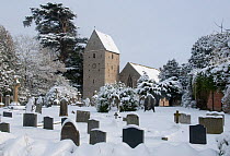 Kinnersley Church in the snow, featuring 13th century tower with saddle-back-roof. Herefordshire, England, December.