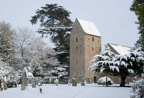 Kinnersley Church in the snow, featuring 13th century tower with saddle-back-roof. Herefordshire, England, December 2010.