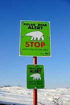 Polar Bear (Ursus maritimus) warning sign "Don't walk in the area" Churchill, Manitoba, Canada, March 2011.