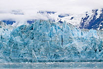 Face of the glacier with massive cracks and seracs, showing layers of ice. Hubbard Glacier, Alaska, United States, July 2010.