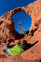 Photographer at Turret Arch. Arches National Park, Utah, USA, November 2010.