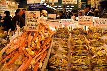 A scene from Pike's Market in downtown Seattle with whole crabs and king crab claws. Washington, USA, April.