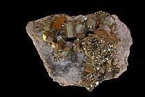 Pyrite (FeS2, iron sulfide), popularly known as 'fool's gold', formerly used in the production of sulfuric acid. Sample from Peru.
