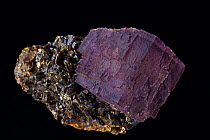 Fluorite (CaF2, calcium fluoride) on Sphalerite (ZnS, zinc sulfide). Fluorite is a source of fluorine-used in the manufacture of milk glass-as a flux for the steel industry and in refining of aluminum...