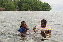 Tetepare women monitor seagrass growth as part of the conservation programme of the Tetepare Descendants Association, Tetepare Island, Western Province, Solomon Islands, Melanesia, July 2010