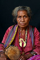 Portrait of East Timorese woman in traditional clothing, Maubara, East Timor, August 2010.