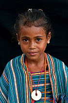 Portrait of East Timorese girl in traditional clothing, Maubara, East Timor, August 2010