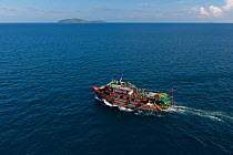 Aerial of a trawler illegally trawling in protected municipal waters, Philippines, May 2009.