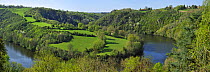 Forests and meadows with hedges along meander of the Creuse River, Indre, France, April 2011.