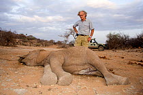 Iain Douglas-Hamilton (elephant researcher and conservationist) looks on at a recently expired elephant (Loxodonta africana). Most likely the result of the drought (2008-2009), the worst in more than...