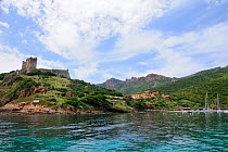 Girolata village, 17th Century Genoese watchtower and harbour, part of a UNESCO World Heritage site within Corsica's National Park (Parc Naturel Regional de Corse). Corsica, France, May 2010.