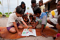 WWF team working with the local community to teach them about their environment, Semporna, Sabah, Borneo, Malaysia, June 2009.
