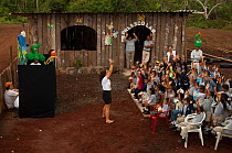 School children watching a Puppet Show explaining environmental issues, presented by members of the Charles Darwin Research Station, Public Relations Department, Puerto Ayora, Santa Cruz Island, Galap...