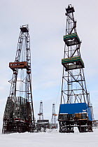 Drilling derricks near Sabetta in the South Tambey gas field. Yamal Peninsula, Western Siberia, Russia, March 2011