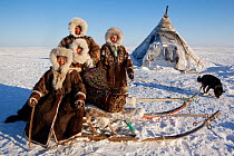 The Vanuito family, Nenets reindeer herders, at their winter camp on the tundra near Tambey. Yamal Peninsula, Western Siberia, Russia, March 2011