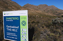 Sign for 'die Hel' / 'the Hell' semi-arid desert, Swartberg Nature reserve. Western Cape, South Africa, April 2011.