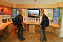 Environmental students watch the live Osprey web cam at the Lyndon Visitor Centre, Rutland Water, Rutland, UK, April 2011
