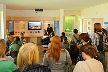 Osprey Project Manager, Tim Mackrill, talking to Environmental Students at the Lyndon Visitor Centre, Rutland Water, Rutland, UK, April 2011