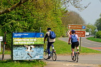 Cyclists arriving at Lyndon Visitor Centre, Rutland Water, Rutland, UK, April 2011