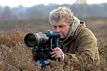 David Tipling, 2020VISION photographer, working at Wetleton Heath, Minsmere RSPB reserve, Suffolk, UK, February 2011. Model released