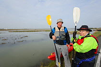 Participants in a Kayak event to canoe around Wallasea Island organised by the RSPB and Burnham-on-Sea Yacht Club. Essex, UK, January 2011