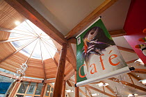 Cafe sign inside the Scottish Seabird Centre in North Berwick showing economic benefits of presence of Bass Rock, Firth of Forth, Scotland, UK, July 2010