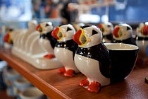 Souvenir shop selling puffin eggcups inside the Scottish Seabird Centre in North Berwick showing economic benefits of presence of Bass Rock, Firth of Forth, Scotland, UK, July 2010