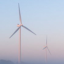 Wind turbines in morning mist. Near Bradworthy, Devon, UK, March 2011.